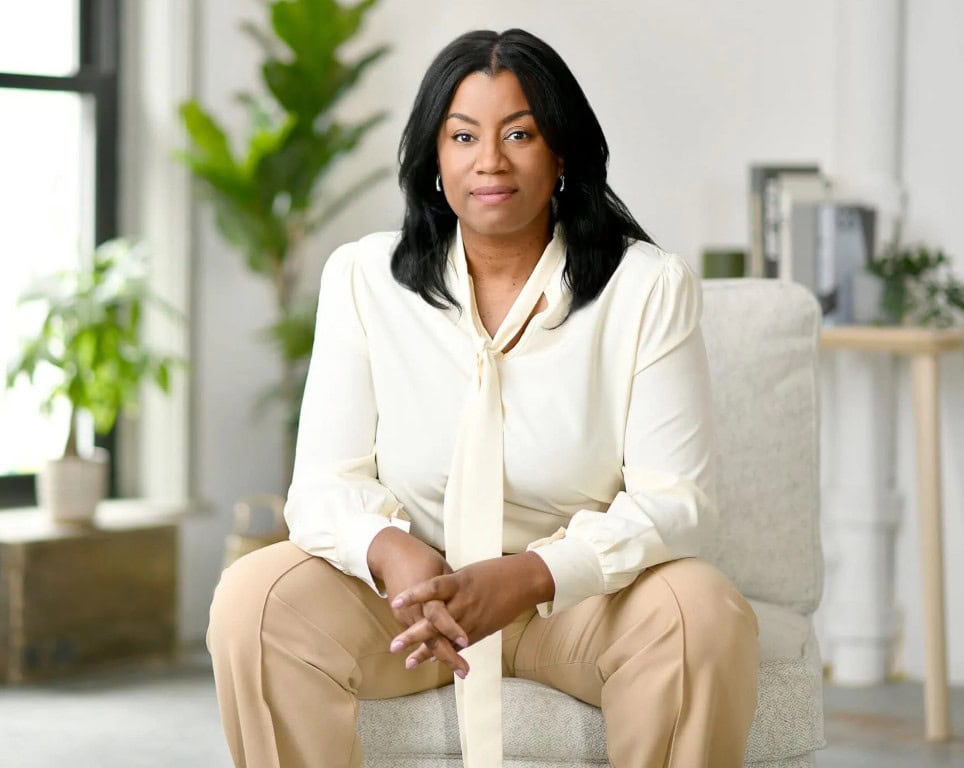 April Howe sitting in bright office space
